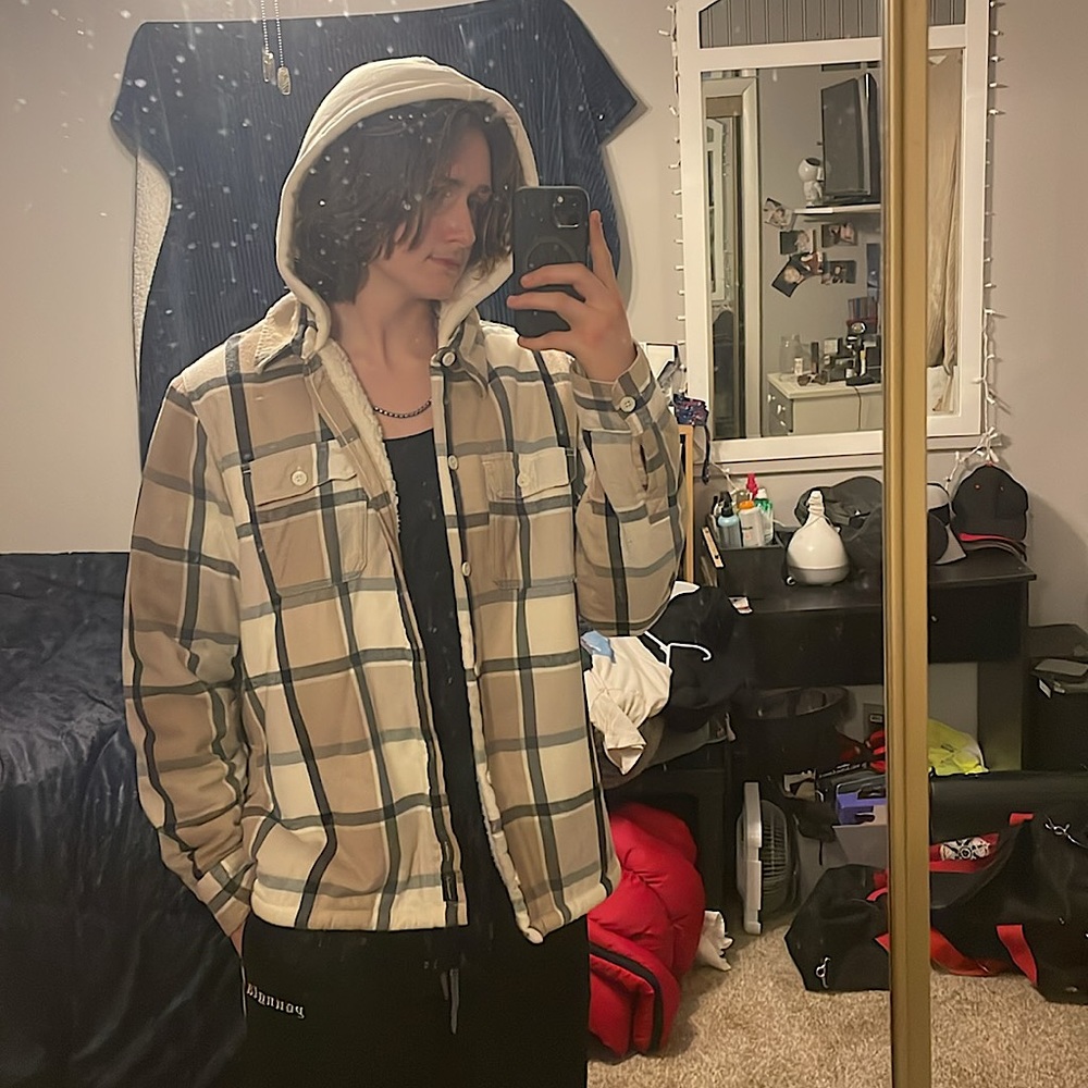Cream colored flannel hoodie lined in fleece